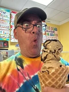 Darrell staring at triple layered Ice Cream Cone - At Mystic Ice Cream